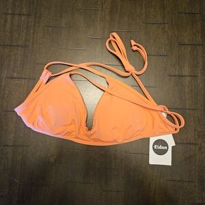 Vibrant Orange Bikini with Cutouts and Smooth Fabric